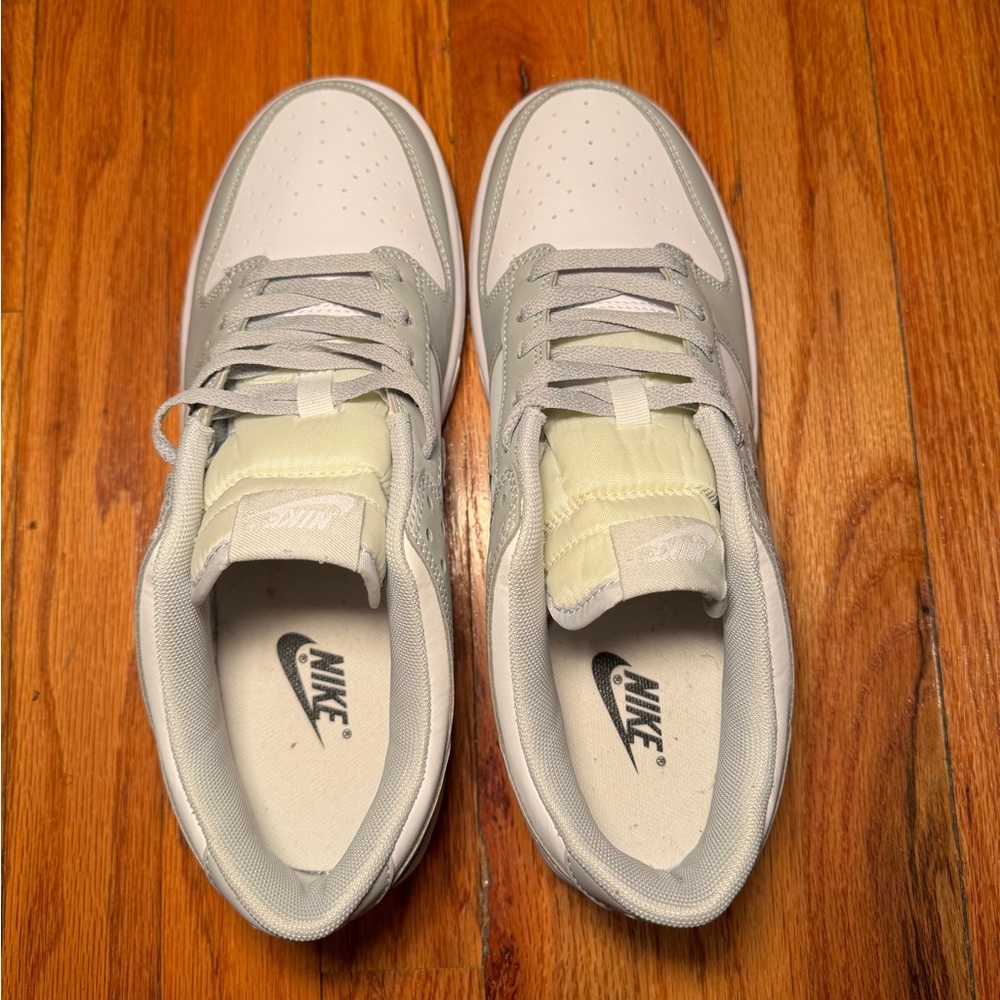 Grey and white low top Nike